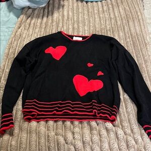 Marled Black Sweater with Red Heart Accents